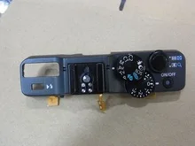На горния капак, в колекцията с кнопочным ключа, резервни части за фотоапарат Canon powershot G16